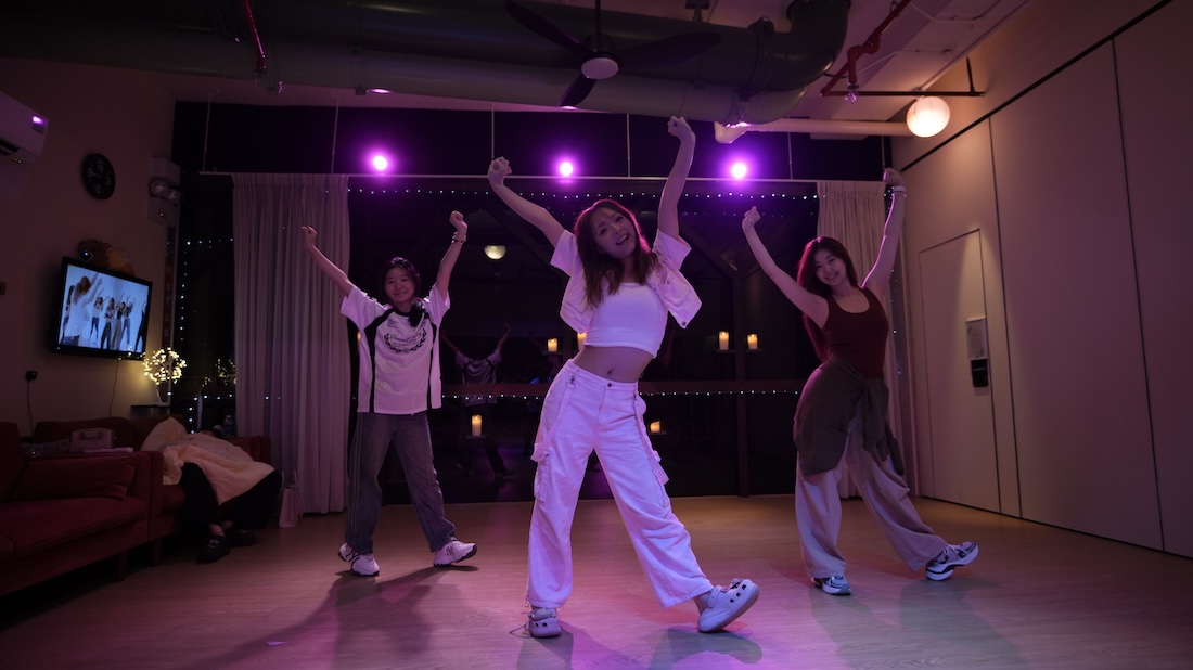 Dancers mid-routine at the studio