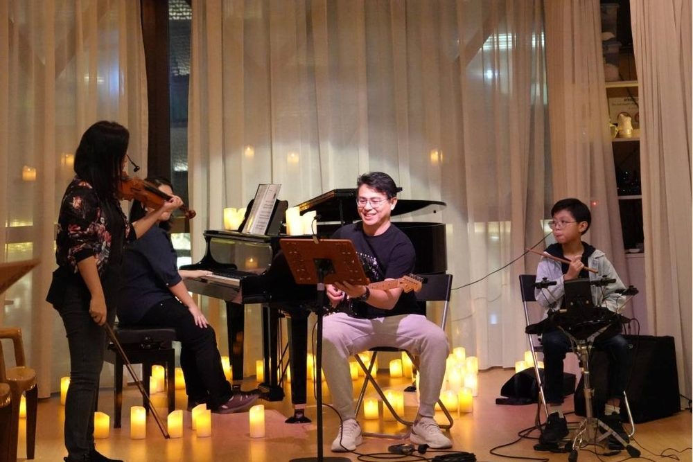A music jamming session by candlelight