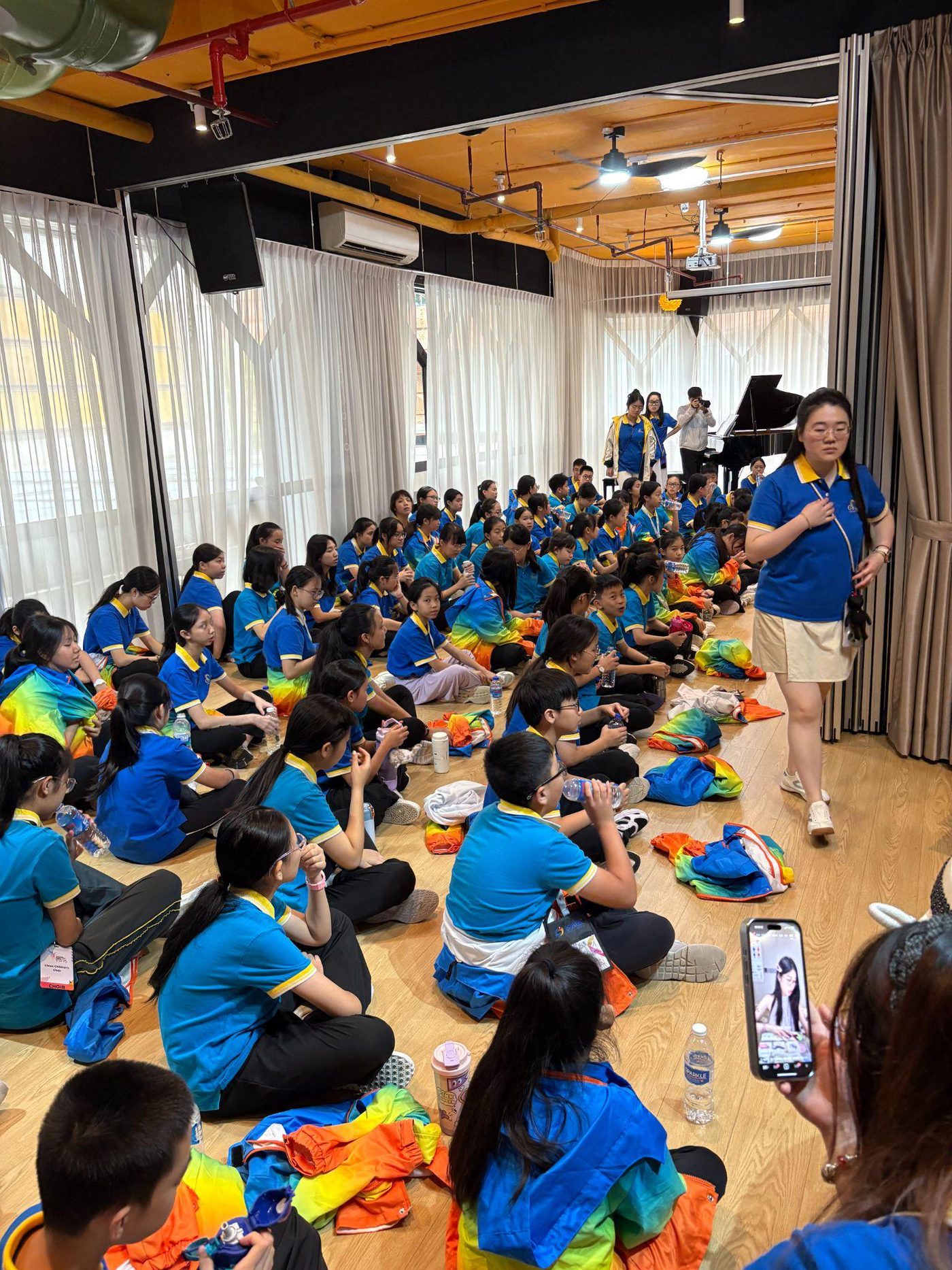 A visiting student choir group at the studio