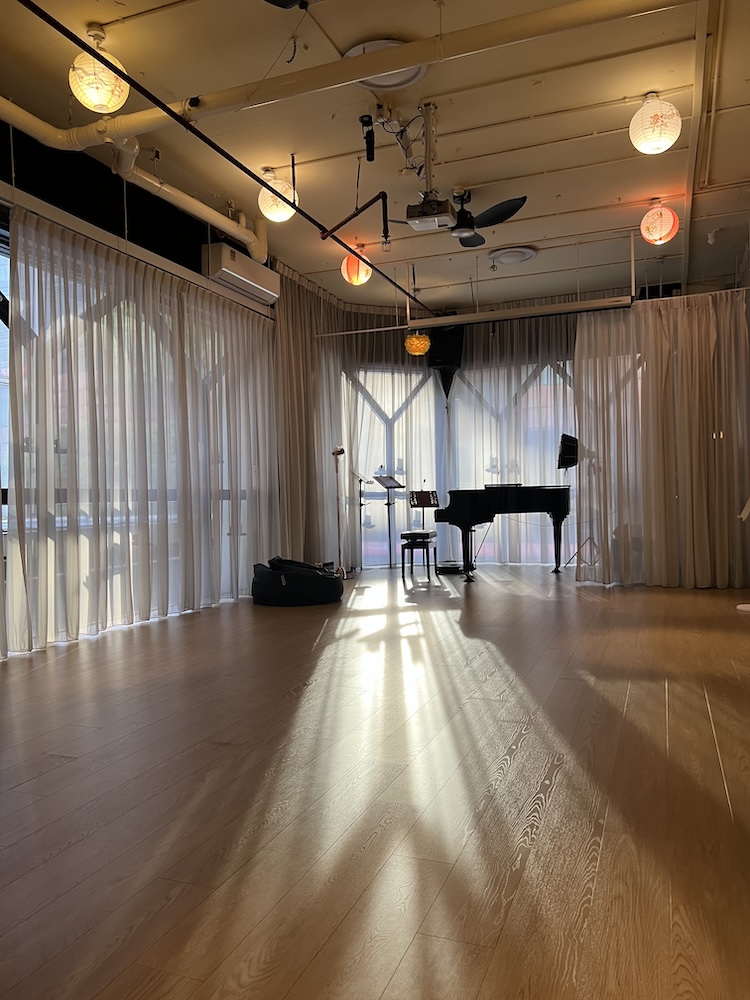 The music studio with a grand piano and natural light