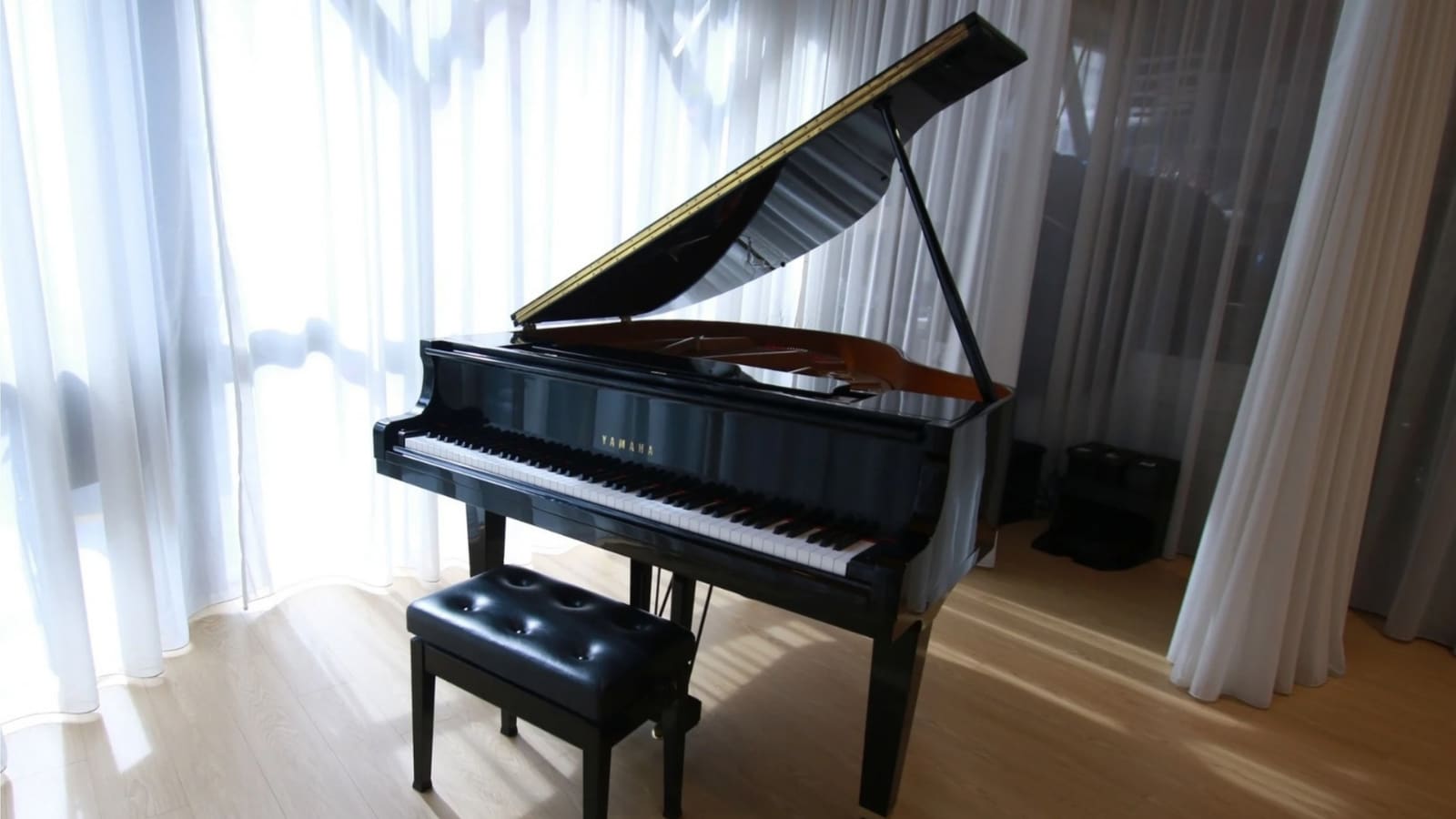Music Studio — a vocal group rehearsing by the windows