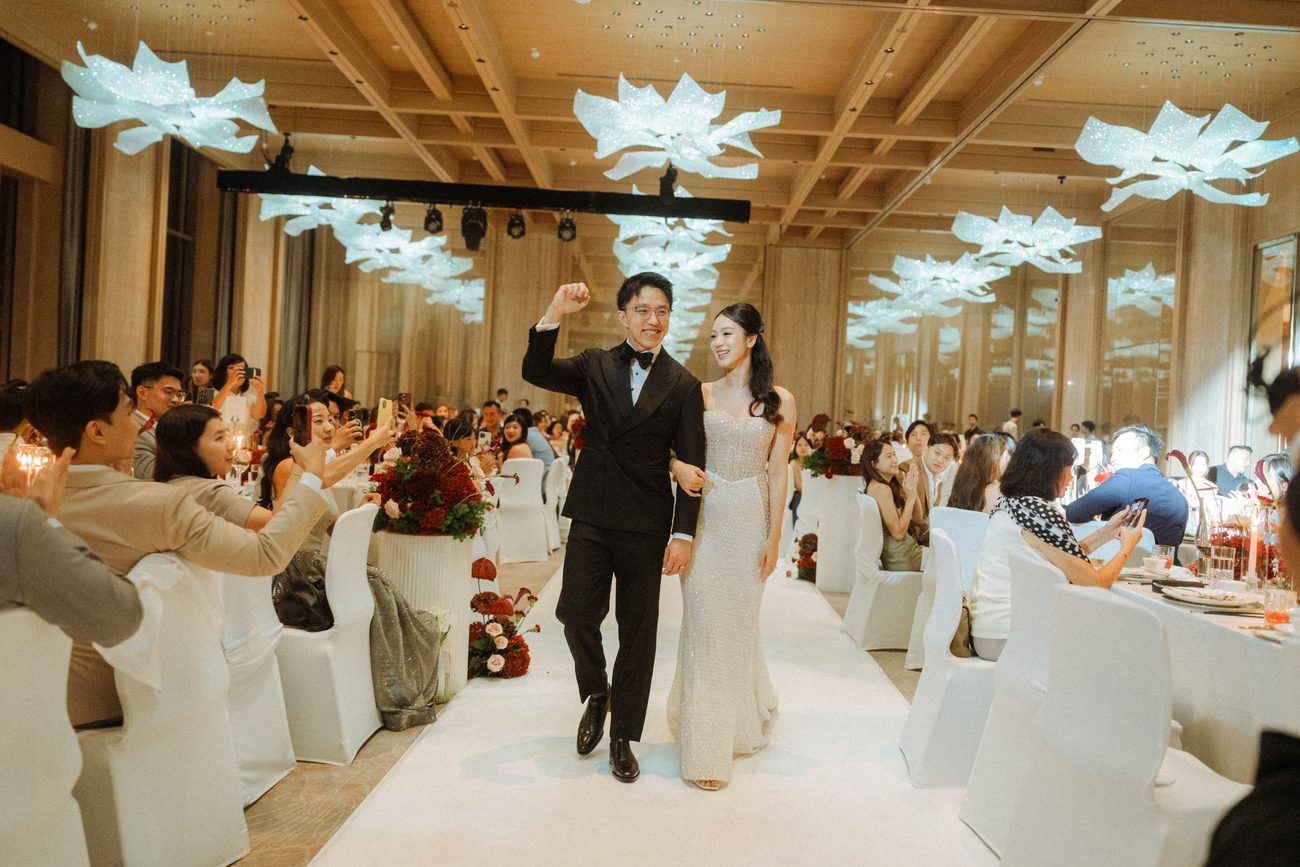 The couple’s grand entrance into the ballroom