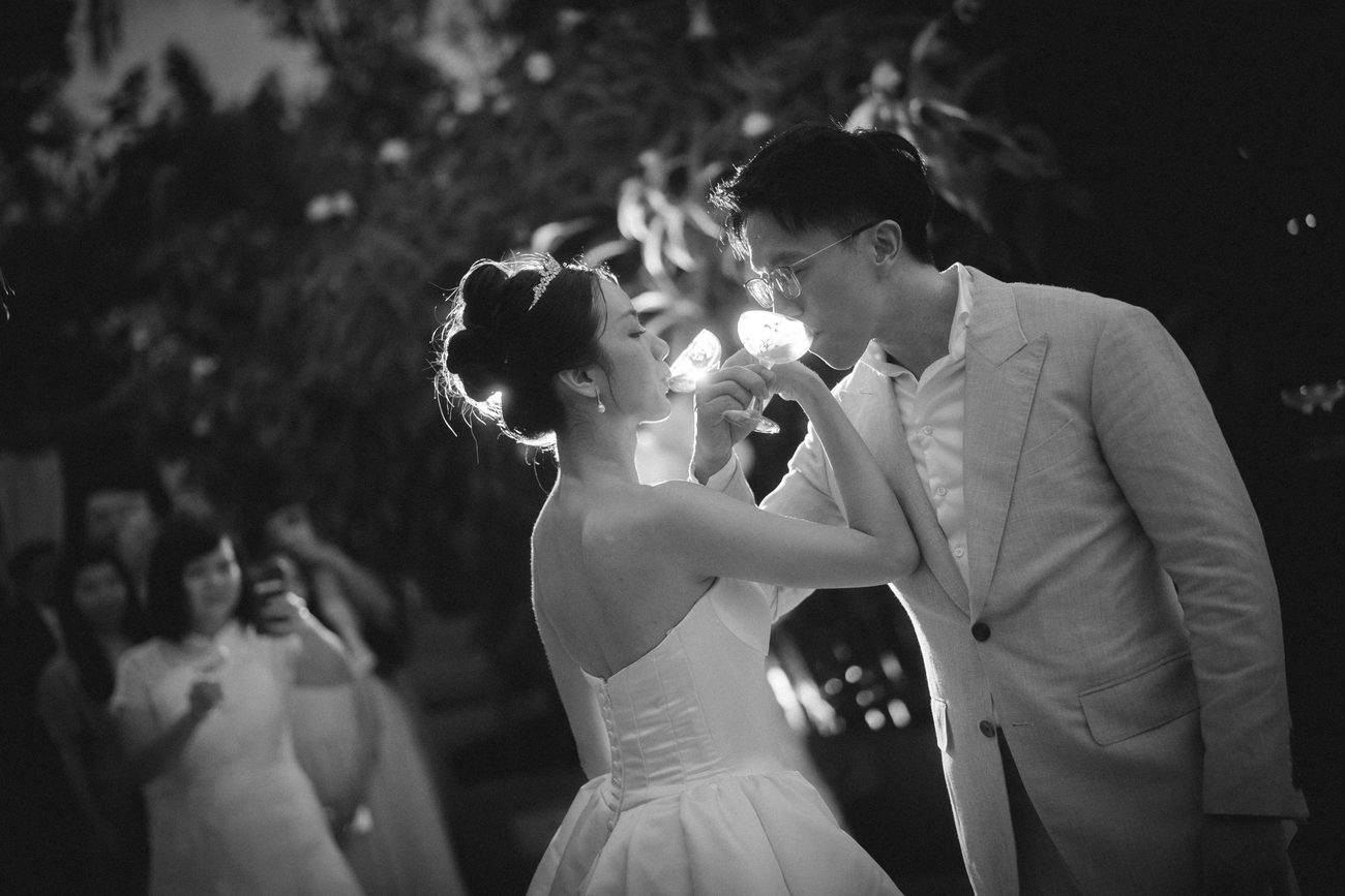 Patrine and Jon during their first dance, in black and white